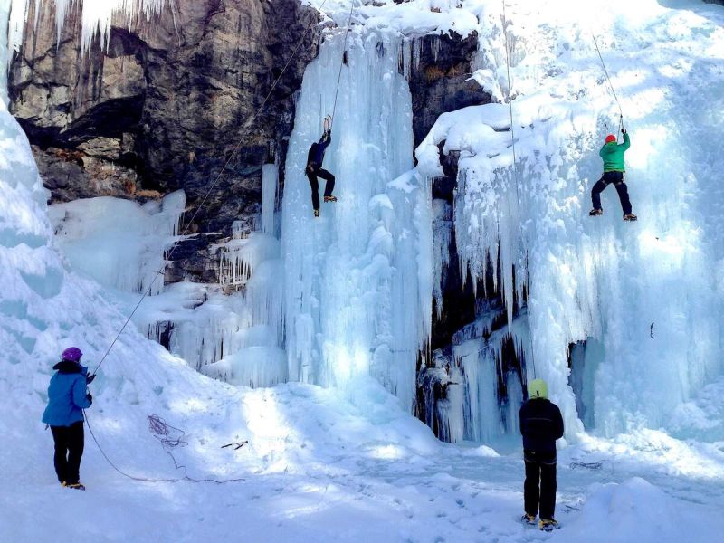 Ice climbing course practicing the climbing techniques